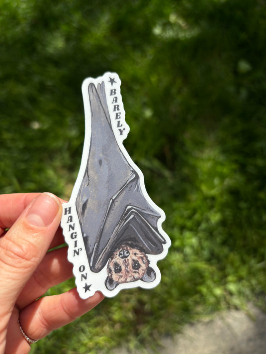 Barely Hanging’ On sticker